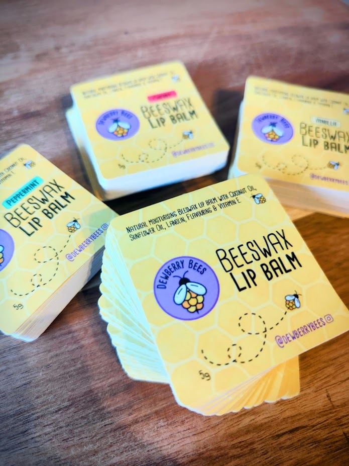 Dewberry Bees Beeswax Lip Balm tins and packaging